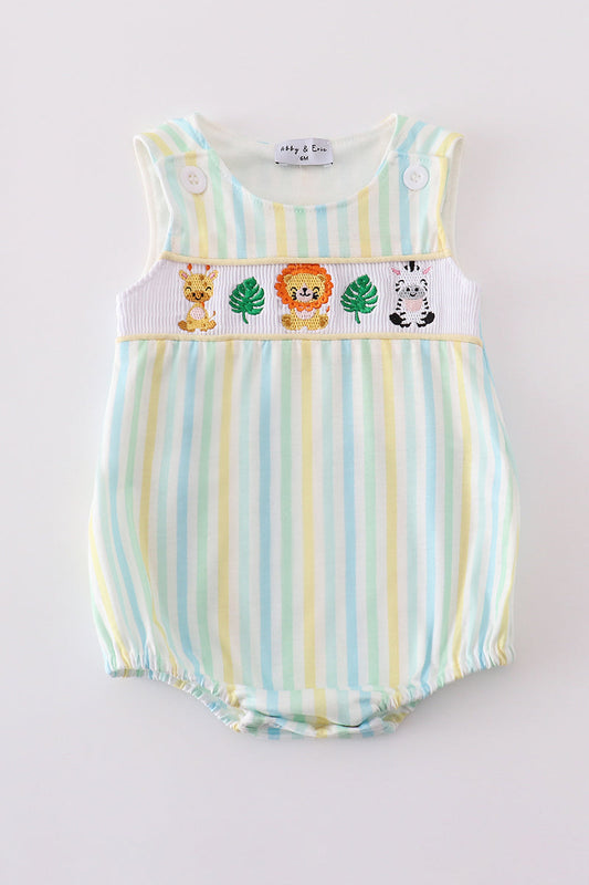 Yellow, white, green, blue striped bubble with smocked giraffe, lion, zebra, and 2 leaves