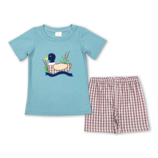 Blue duck tee with brown plaid shorts