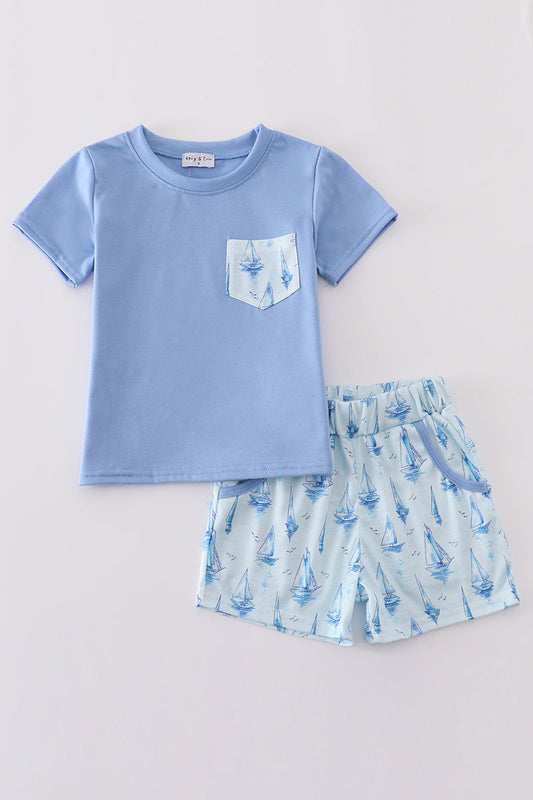 Blue sailboat pattern shorts and blue shirt with sailboat pattern pocket
